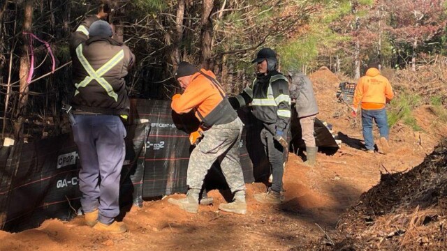 River's Edge Phase III men working