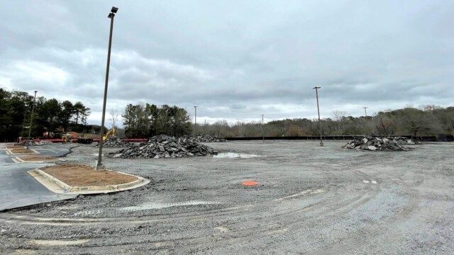 asphalt cleared off parking lot