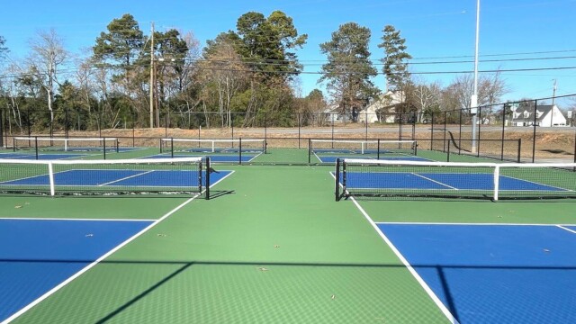 Tennis courts before a street