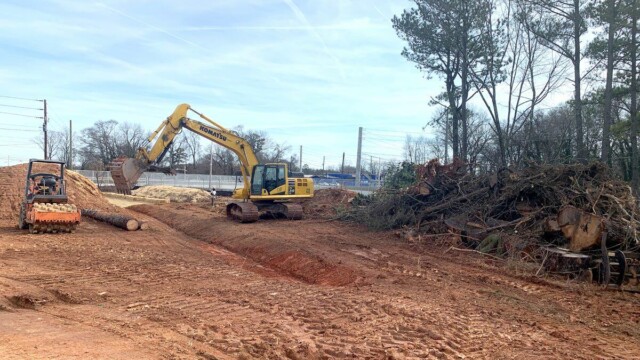 Fire Station 9 - Excavator Digging A Drainage System - Clayton County Fire Station 9 - Excavator Digging A Drainage System