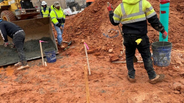 Fire Station 9 - Men Working With Dirt Cement And An Excavator - Clayton County Fire Station 9 - Men Working With Dirt Cement And An Excavator