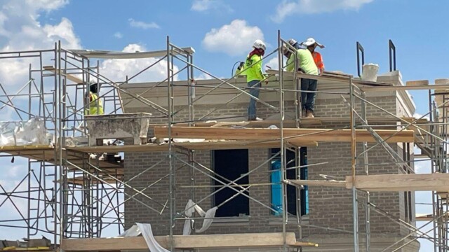 Clayton County Fire Station No. 1 Replacement men on scaffold outside of building