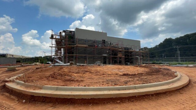 Fire Station 9 - Scaffolding Surrounding The Building With View Of Unpaved Driveway - Clayton County Fire Station 9 - Scaffolding Surrounding The Building With View Of Unpaved Driveway