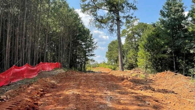 River's Edge Phase III pathway with tractor tracks