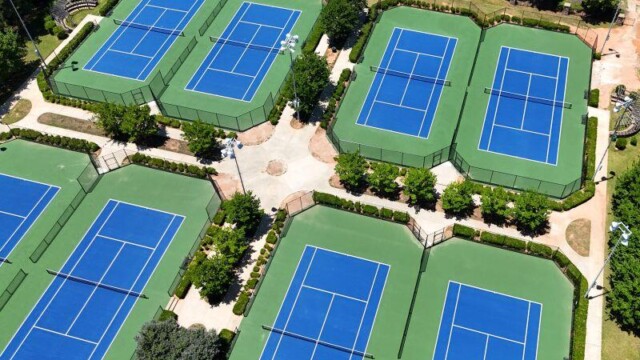Aerial view of eight tennis courts