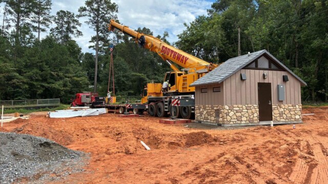 District 2 Pocket park crane and stand along business