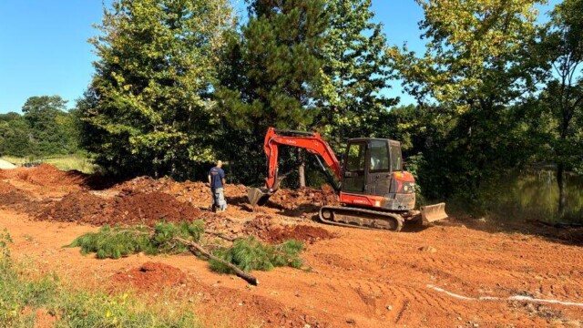Dirt, bulldozer and worker Dirt, bulldozer and worker
